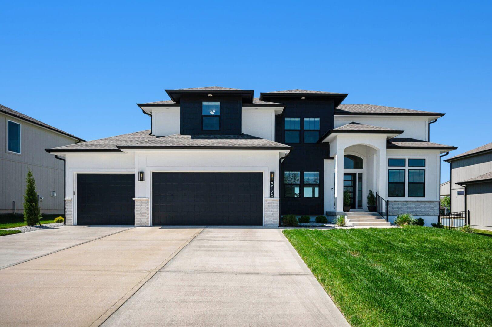 Modern two-story suburban home with three-car garage